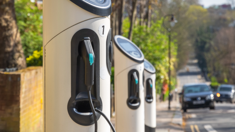 Ev chargers lined up on a street