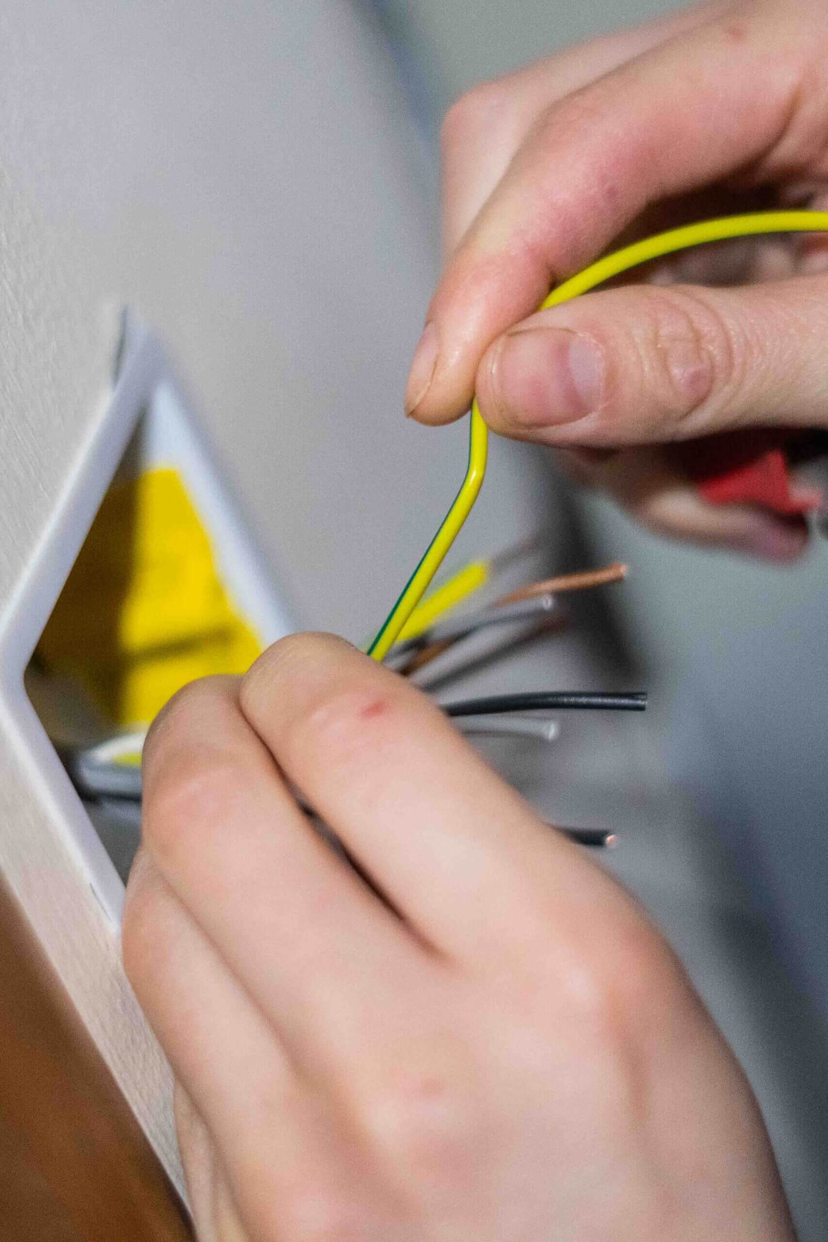 Hands doing electrical Work